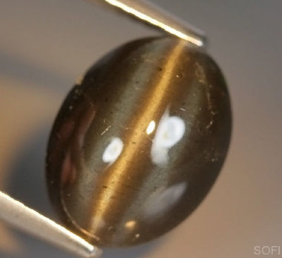  Камень Скаполит натуральный с эффектом кошачьего глаза 5.61 карат арт. 22300