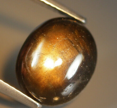  Камень черный звездчатый сапфир натуральный 5.65 карат арт 28354